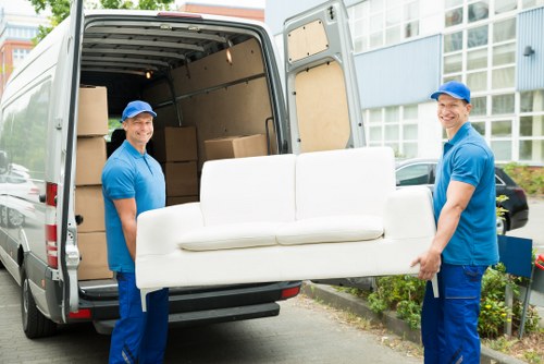 Man With Van Poplar pricing explained with moving boxes and loading support