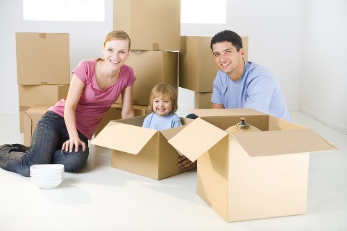 House movers working on a Poplar residential move near local apartment blocks