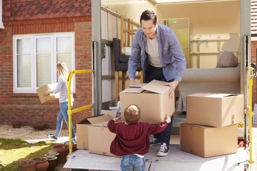Careful loading of household furniture for a Poplar relocation