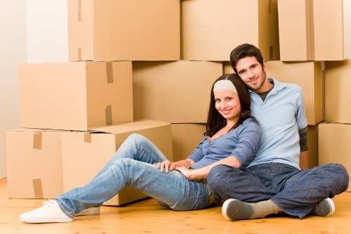 Removal van and moving boxes prepared for a Poplar home move