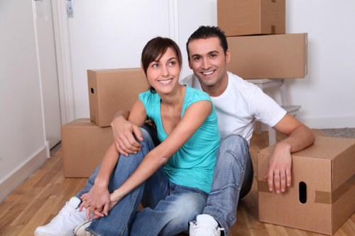 Packed boxes and furniture ready for loading